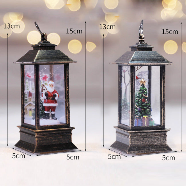 Santa lantern and Christmas tree lantern side by side, about 2 in wide and 6 in tall with the ring