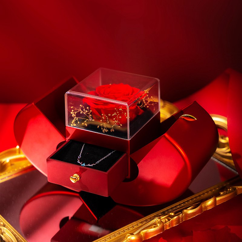 Apple rose box with a necklace in the open drawer