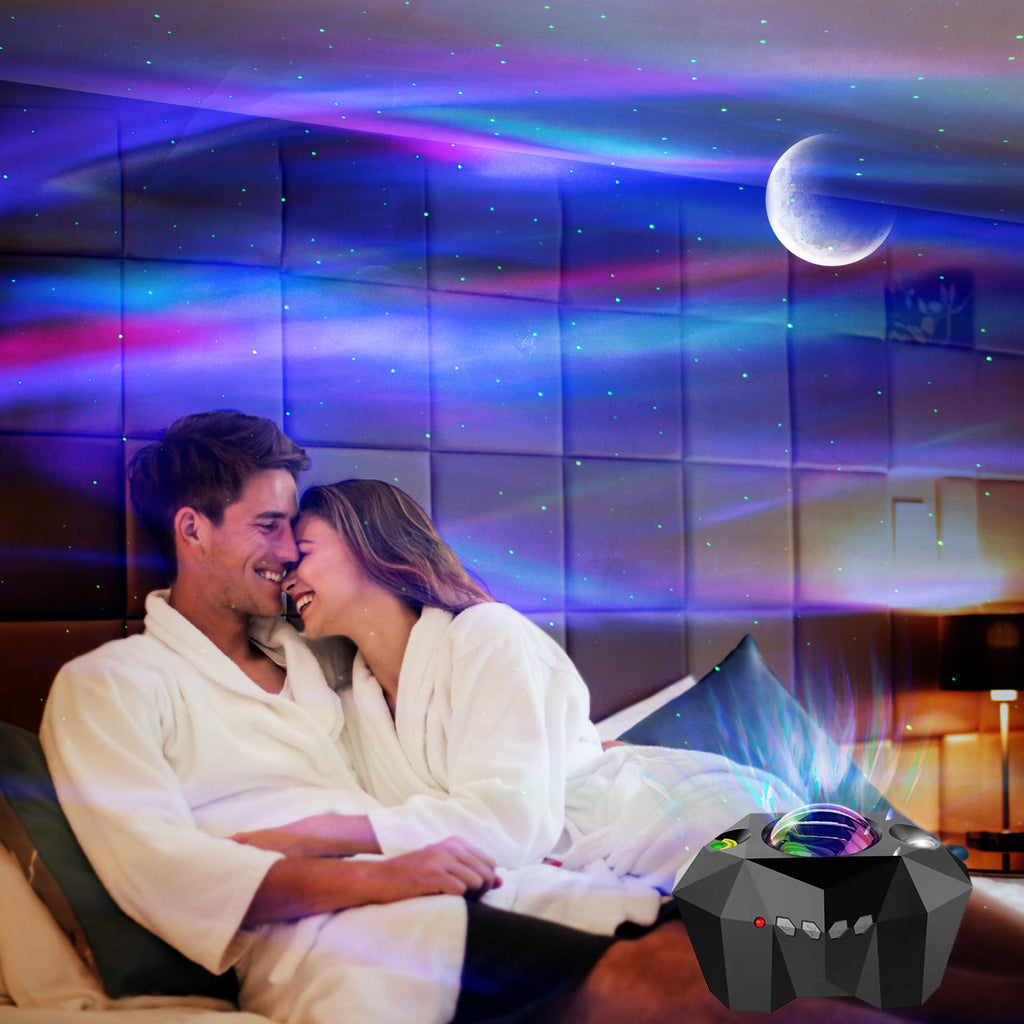 Ocean wave projector lighting up a bedroom ceiling