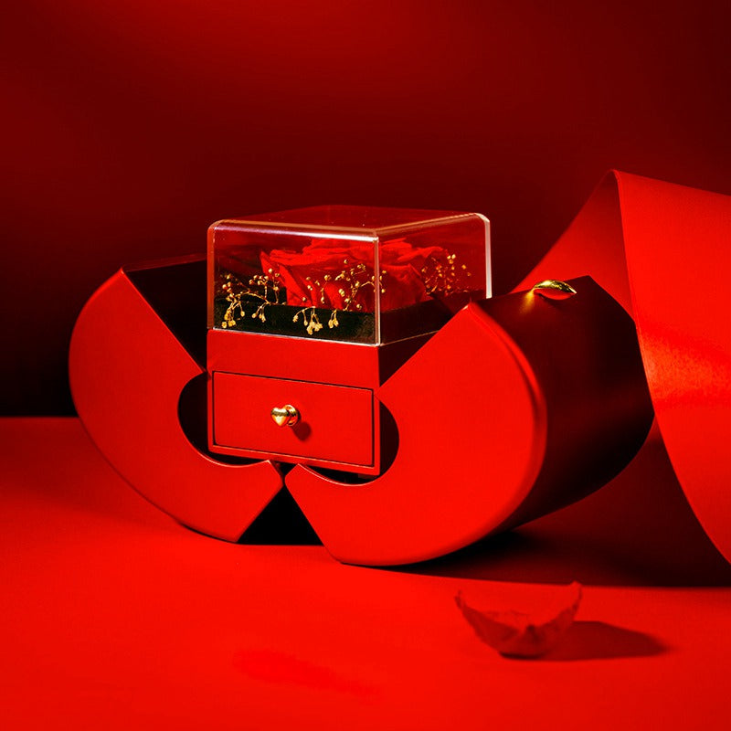 Apple rose box opened on a red backdrop