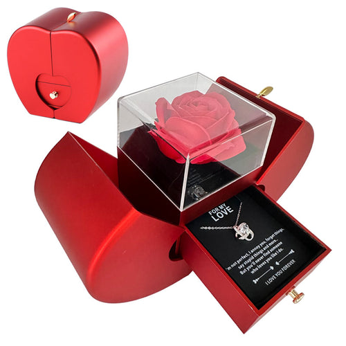 Red apple-shaped rose box open, necklace on a love message card in the drawer